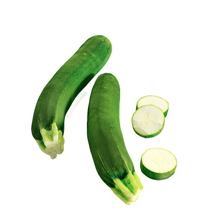 A 3D of freshly cut zucchini on a white background