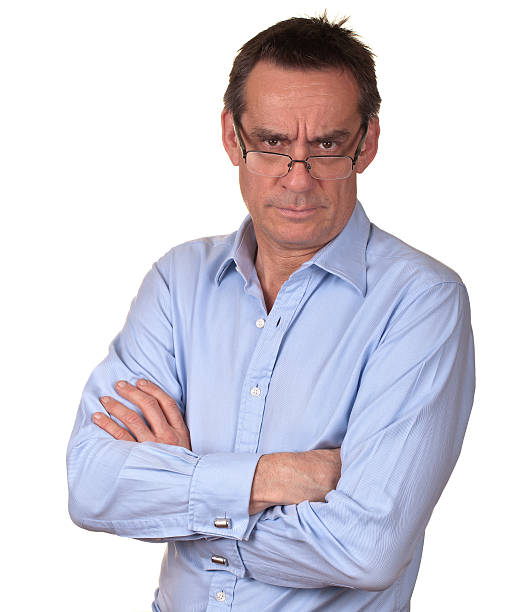 istock Angry Frowning Business Man Looking Over Spectacles 177024694