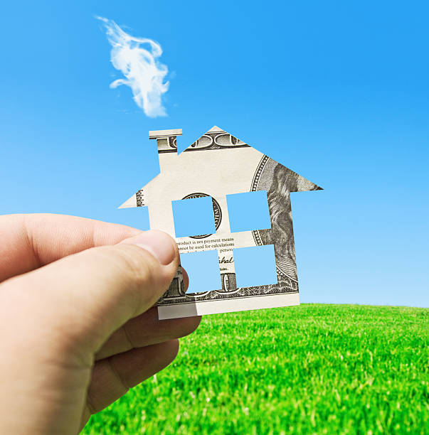 istock money on a new house 177024968