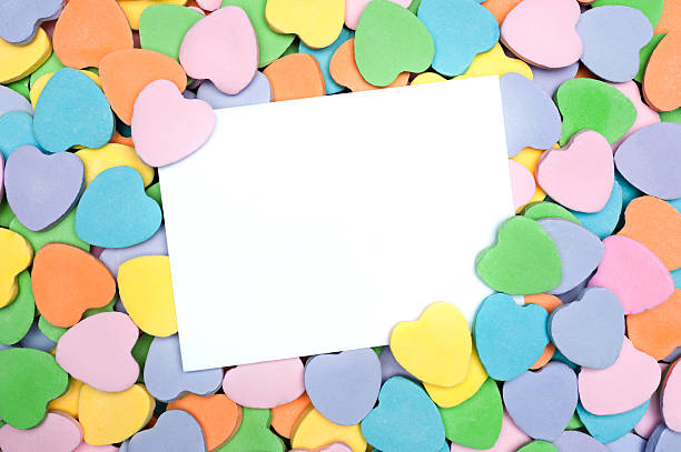 istock Blank card in heart shaped candy pile 177024994