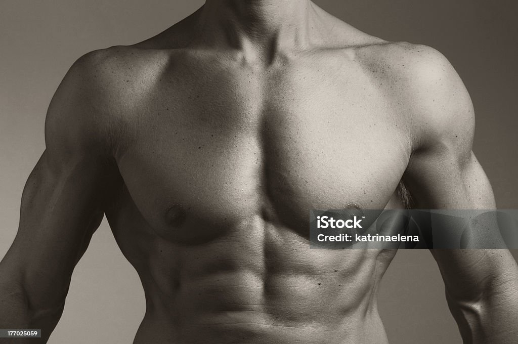 Tronco di un uomo muscolare - Foto stock royalty-free di Addome