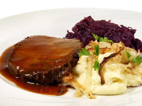 Braised Beef Roast with red Cabbage and mashed Potatos