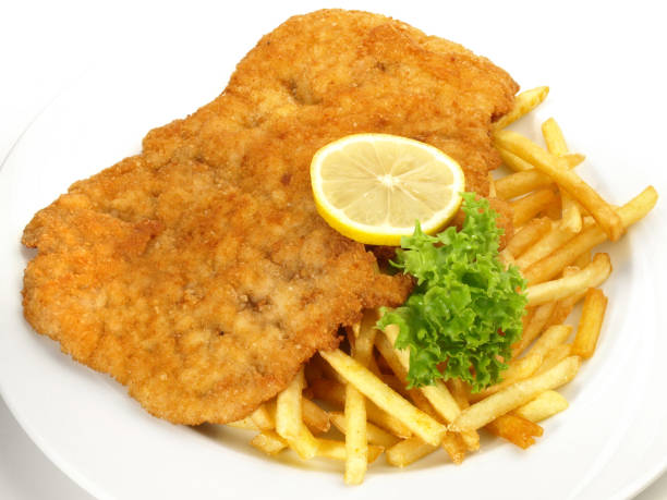 istock Breaded Schnitzel with French Fries - Isolated 1770255055