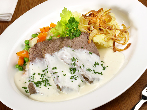 Traditional boiled Beef with mashed Potatoes and Horseradish Sauce