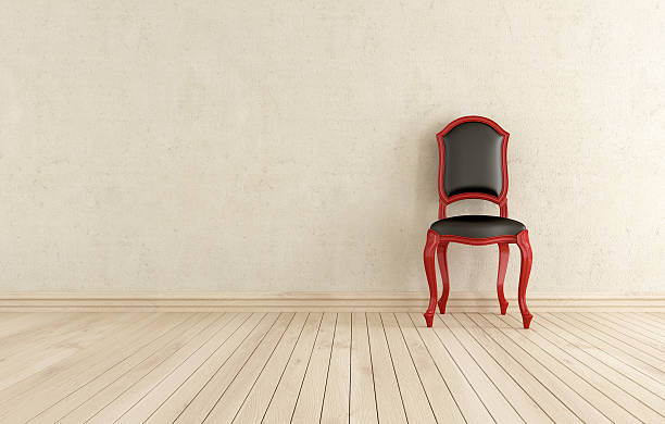 istock red and black classic chair against wall 177025953