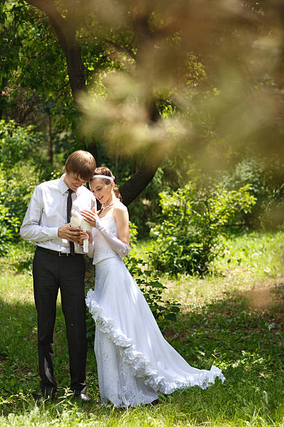 istock couple with pigeons 177025954