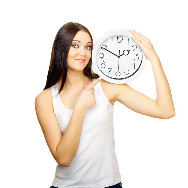 istock The girl with clock on a shoulder 177026127
