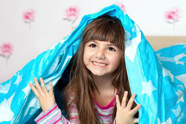 istock girl under the blanket 177026198