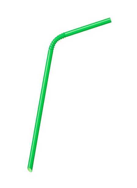 istock A green bendy drinking straw on a white background 177026223