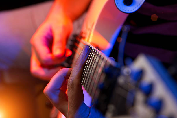 istock young male musician with a white guitar 177026523