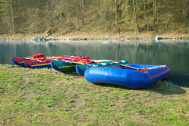 istock Catamarans and inflatable boat ashore 177026571