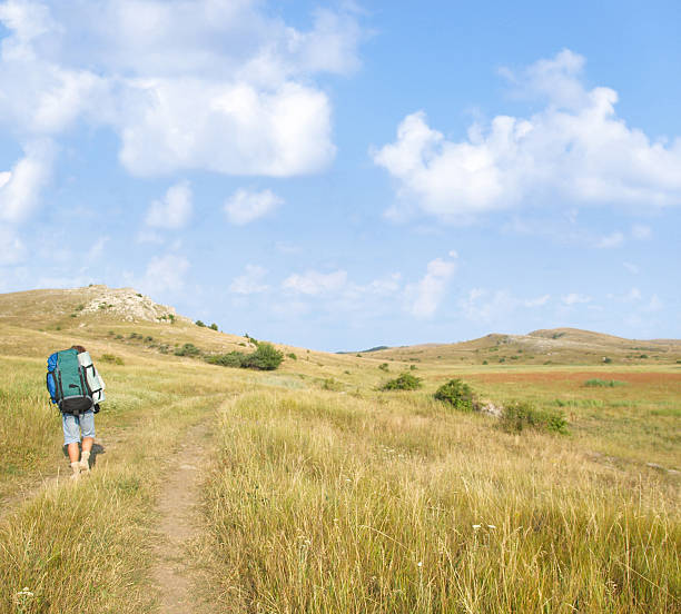 istock Man walking along the road 177026789