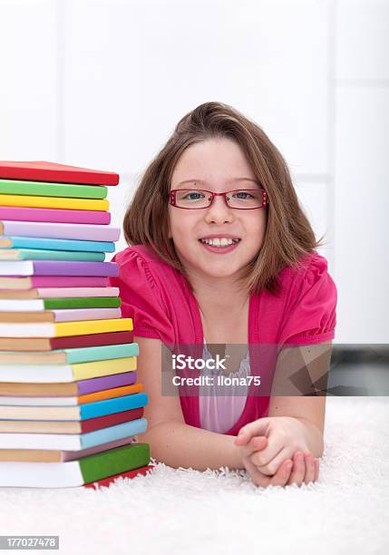 Young Girl With Lots Of Books Stock Photo - Download Image Now - Adolescence, Baby - Human Age, Baby Girls