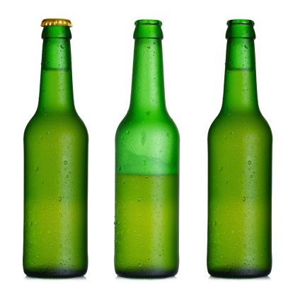 Diferent sizes of bottles in a white background