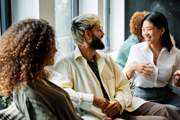 istock Coworkers chatting and smiling on a work break 1770276547