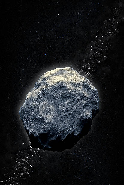 istock A gray asteroid heading for earth against a dark background 177027670