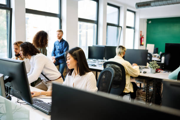 istock Coworking space with multi-ethnic young people working 1770277473