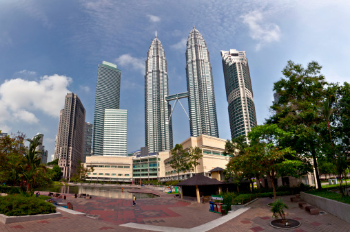 cityscape with Petronas towers of the downtown area of Kuala Lumpur, capital city of Malaysia