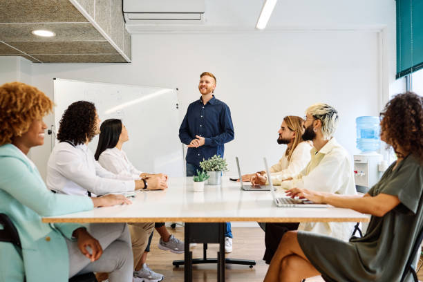 istock Multi-ethnic young coworkers in a meeting together 1770280569