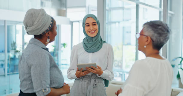 istock Business women, team and tablet for collaboration, manager feedback and Human Resources update, chat or conversation. Happy employees in HR diversity, office workflow and b2b planning on digital tech 1770283856