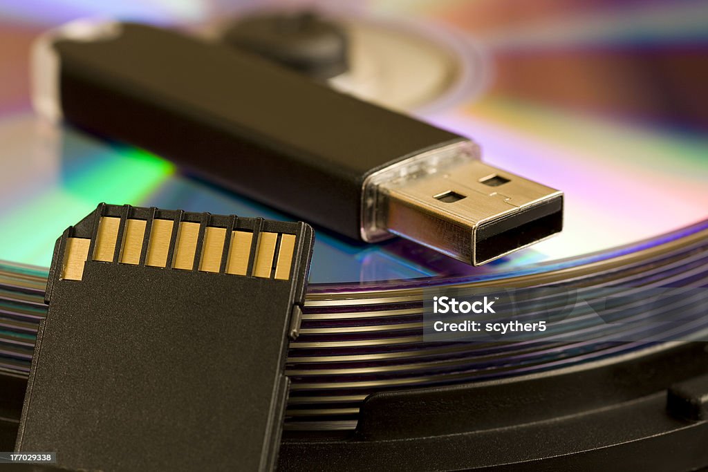 Cd, USB, SD card Cds and usb devise with Camera SD card Recovery Stock Photo