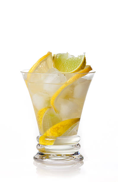 yellow cocktail with lemon on white background