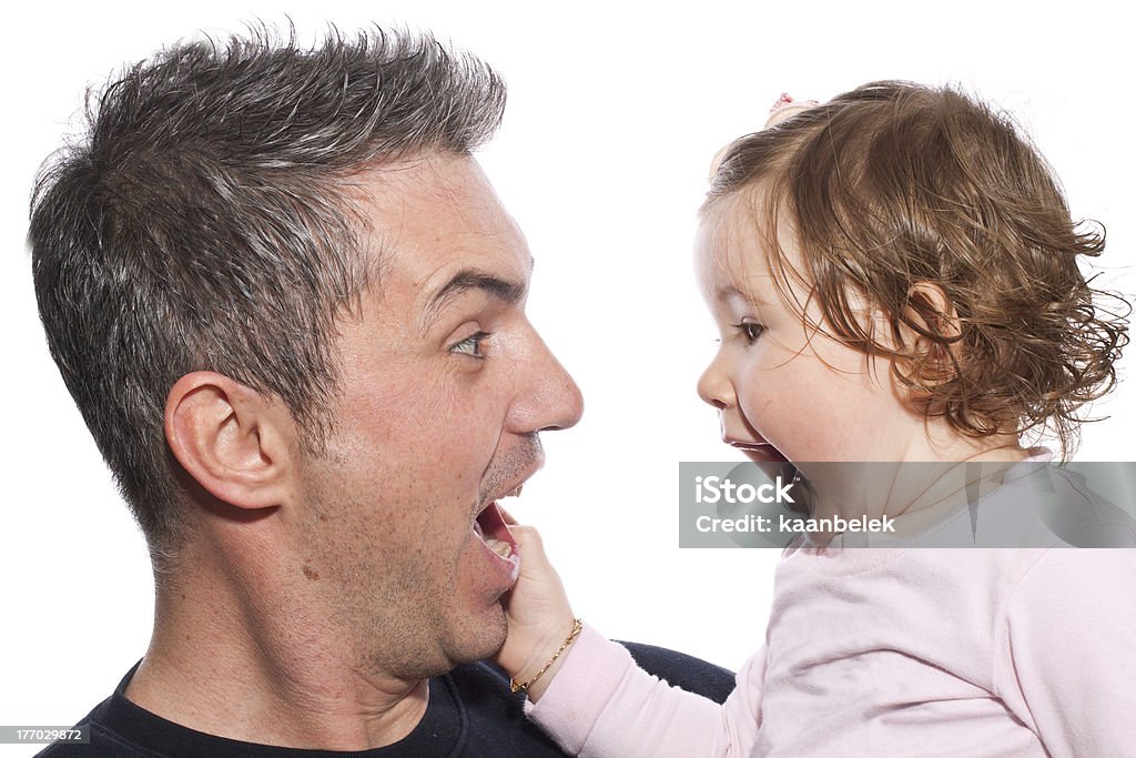 father and daughter "Father and daughter have fun, isolate on white - (isolated over a white background)" Baby - Human Age Stock Photo