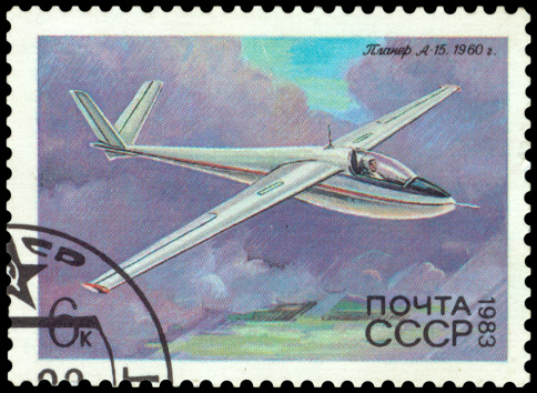 A Stamp printed in USSR shows the Plane over river, circa 1955