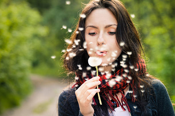 istock Girl with dandelion 177029983