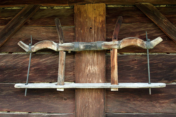 Oxen yoke Ox wooden yoke in a Hungarian open air museum in Szendendre. yoke stock pictures, royalty-free photos & images