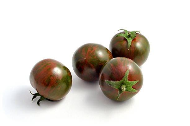 tomates cereja tipo heirloom - tomato heirloom tomato vegetable isolated - fotografias e filmes do acervo