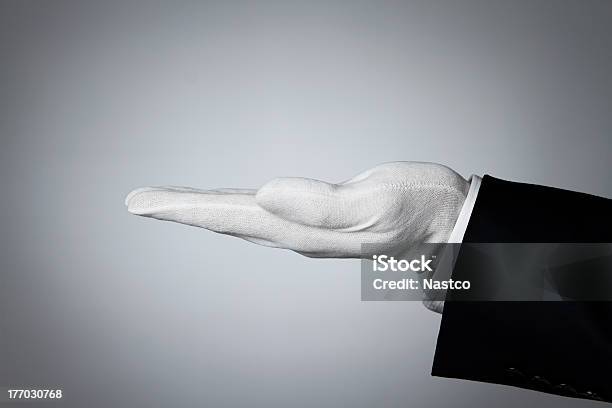 Butlers Hand - zdjęcia stockowe i więcej obrazów Rękawica ochronna - Rękawica ochronna, Rękawiczka, Biały