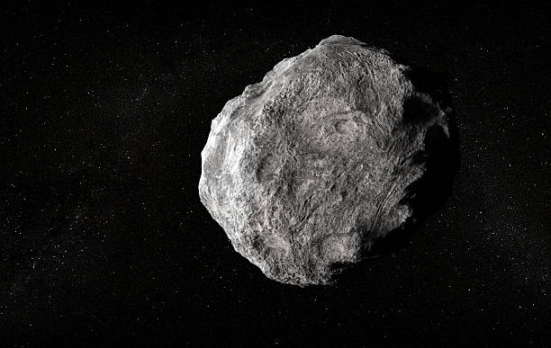 Large planetoid Large planetoid in empty space asteroid stock pictures, royalty-free photos & images