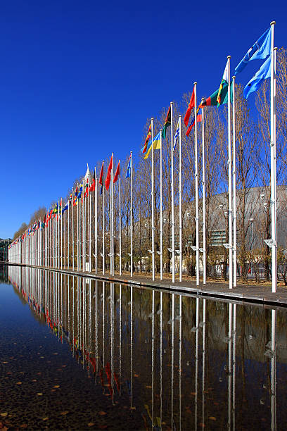 флаги the world - national flag flag global communications sky стоковые фото и изображения