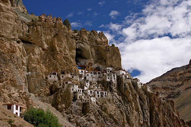 phuktal monastery on the rocks stock photo