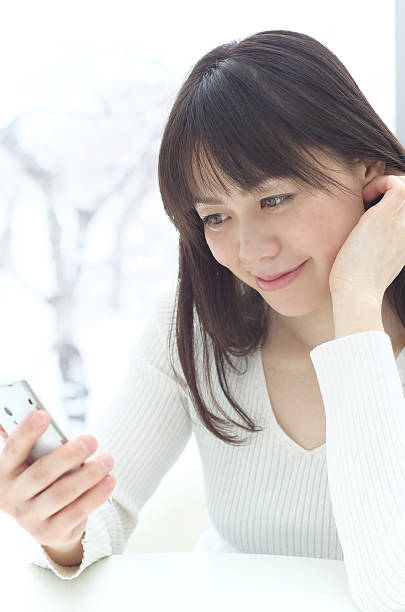 istock Young woman using a smart phone 177032364