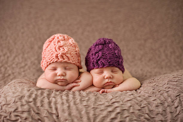 Sleeping Twin Newborn Girls