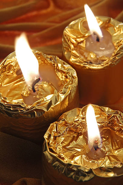 golden candles stock photo