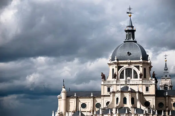 "The Almudena Cathedral with Storm Clouds, Madrid, Spain"