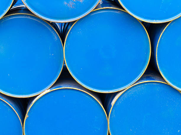 istock Stack of painted blue oil barrels 177033123