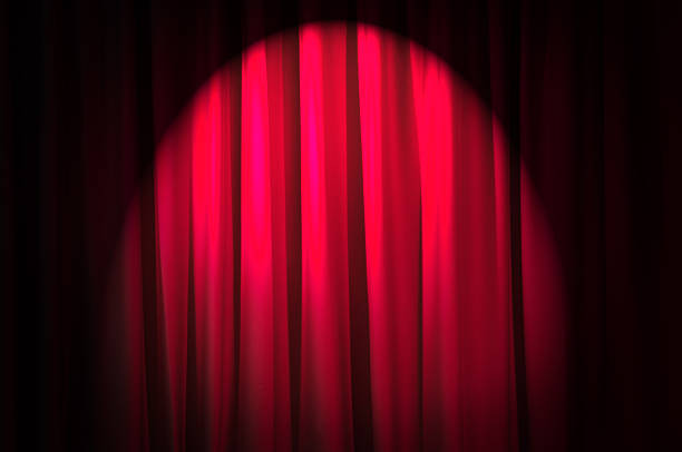 istock Brightly lit curtains in theatre concept 177033264