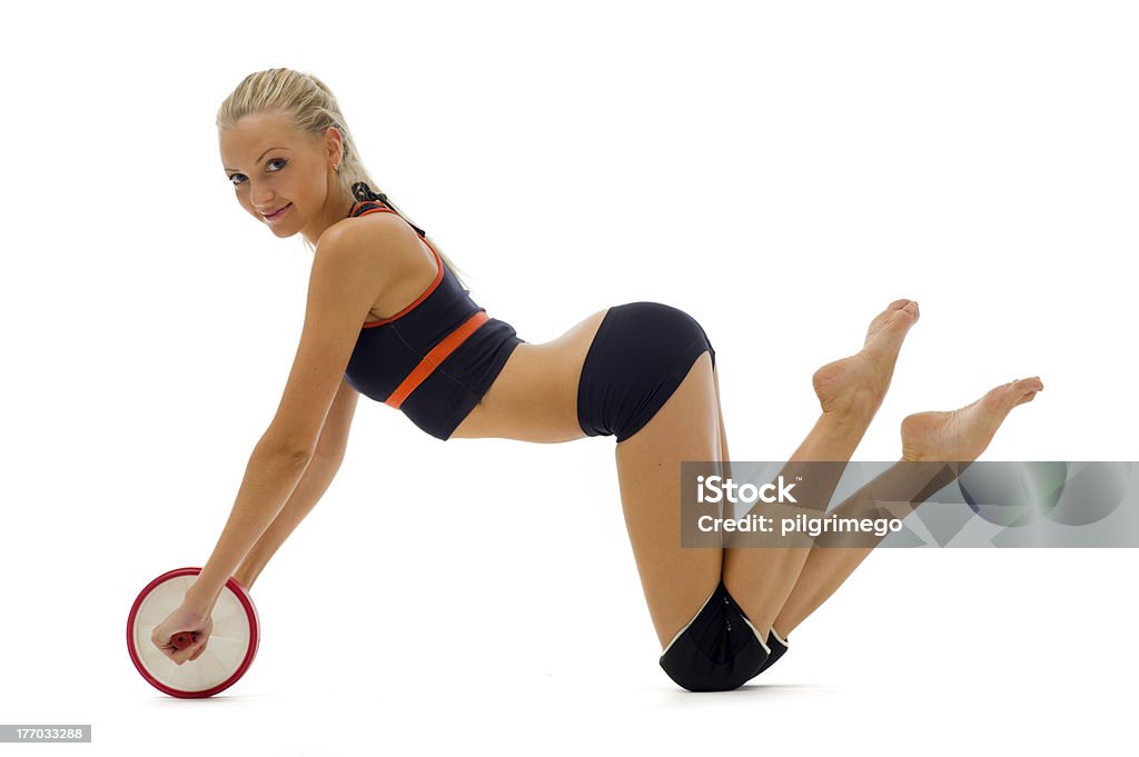Красивая блондинка делает Фитнес-упражнения - Стоковые фото Активный образ жизни роялти-фри