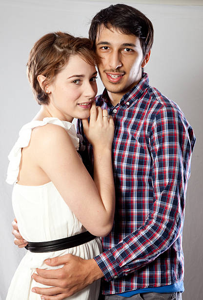 istock Cute couple holding each other with smiles 177033814