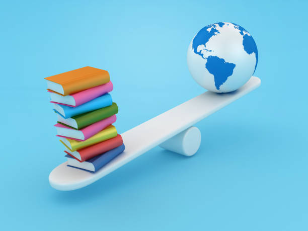 istock Stack of Books on Seesaw with Globe World Map 1770341457