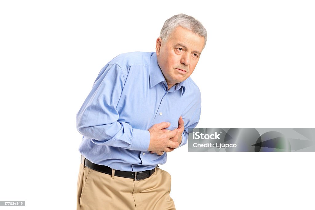 Senior homme avoir une crise cardiaque - Photo de Adulte libre de droits