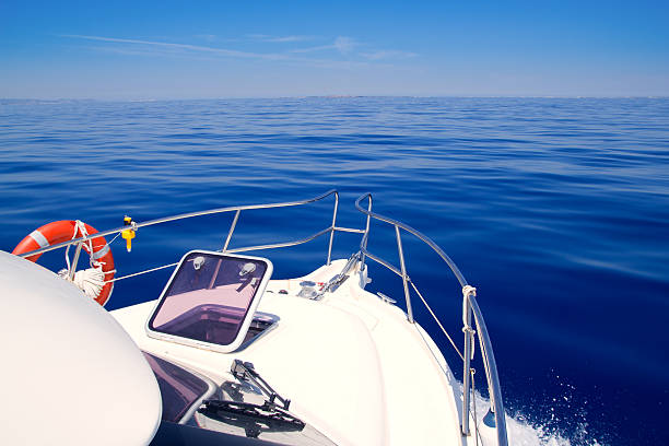 istock Boat bow open porthole sailing blue calm sea 177034846