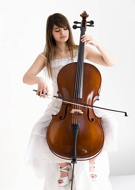 istock Girl with cello 177035024