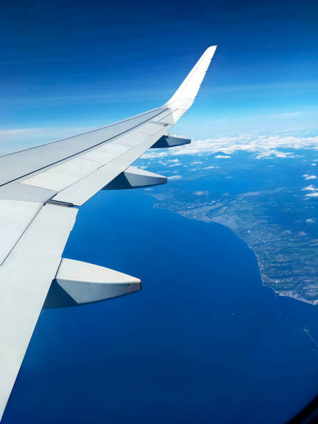 istock Airplane wings and coast 1770350570