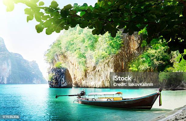 Long Boat On Island In Thailand Stock Photo - Download Image Now - Andaman Sea, Asia, Bay of Water