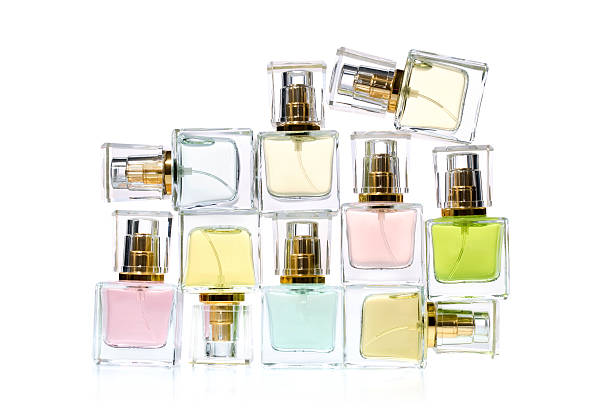 Bottles of perfume Perfume in bottles over white background perfume sprayer stock pictures, royalty-free photos & images